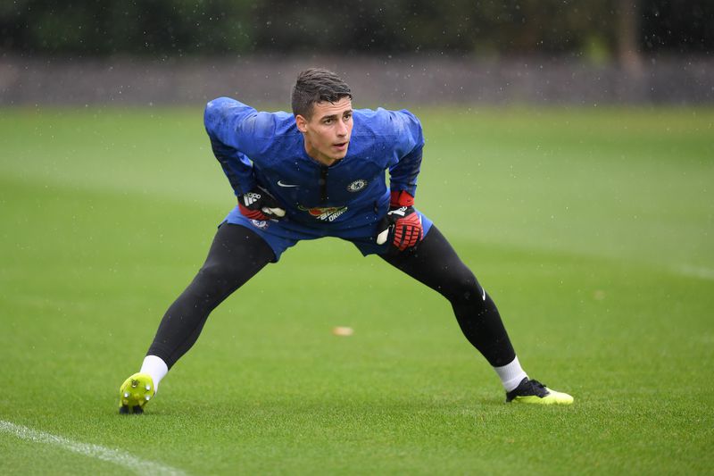 Kepa Arrizabalaga does physical stretches in first Chelsea training